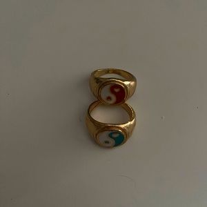 Gold blue and red ying yang rings